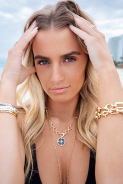 DIAMOND & ONYX COMPASS CHARM WITH JAGGED EDGE