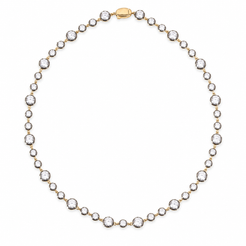 A yellow gold tennis necklace featuring round-cut clear gemstones in bezel settings, arranged in a circular shape on a solid white background.