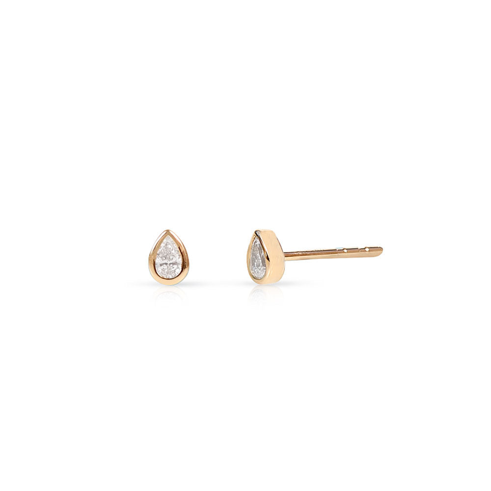 PEAR-SHAPED BEZEL SET DIAMOND STUDS