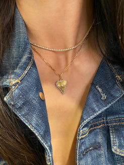 14K Gold Fluted Heart Charm with Diamonds
Gold Heart Charm with Diamond Accents
Fluted Heart Pendant in 14K Gold
14K Gold Heart Charm with Diamonds
Diamond-Embellished Fluted Heart Charm
Heart charm
Diamond heart
Gold heart pendant
Fluted charm
Luxury heart charm
Diamond pendant
Gold charm
Elegant heart necklace
Fine jewelry heart charm