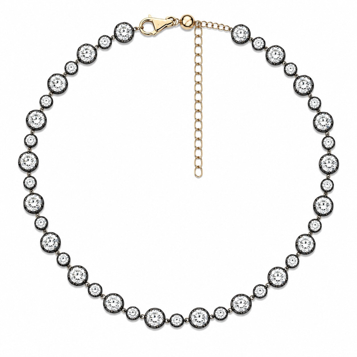 A round tennis-style necklace featuring clear round-cut stones surrounded by blackened silver settings, connected by a gold-tone chain with a lobster clasp and extension chain, shown on a plain white background.
