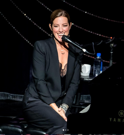 SARAH MCLACHLAN WEARING DIAMOND WING NECKLACE